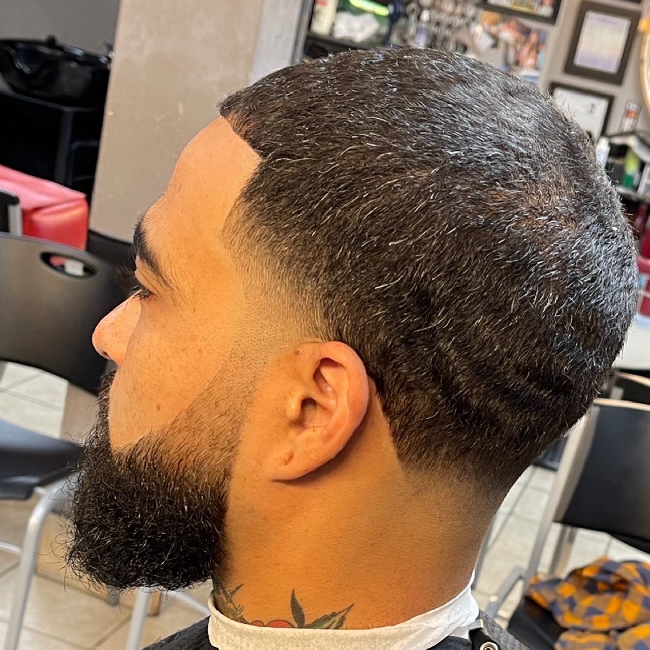 Low fade with full beard sculpt