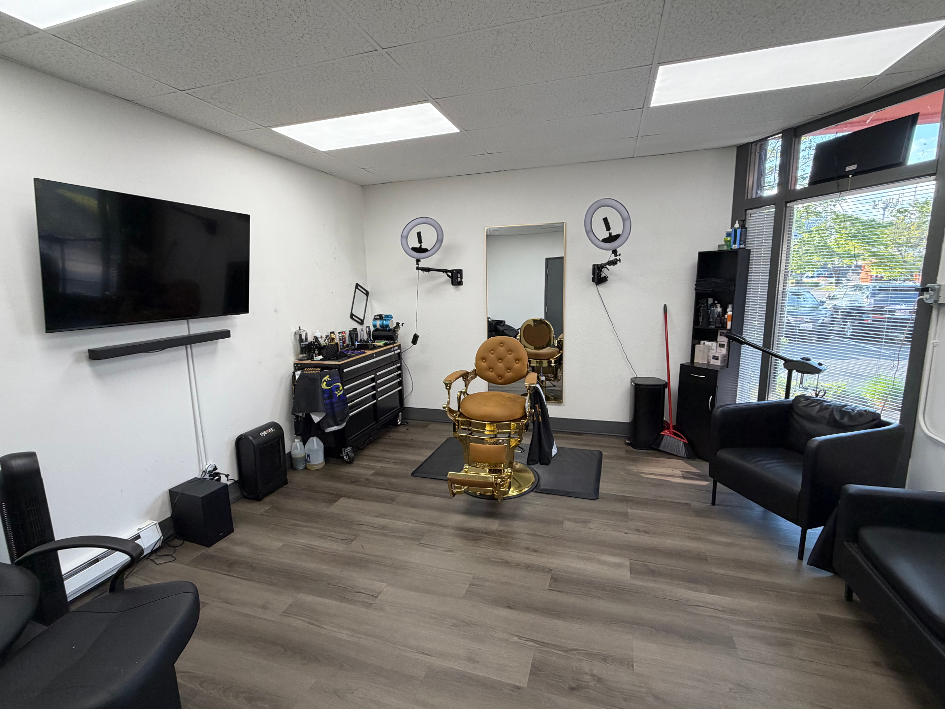 The Gentlemen's Lounge Barbershop interior with vintage chairs